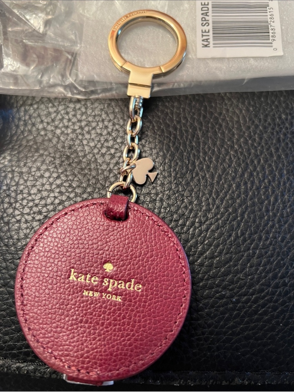 kate spade Burgundy Round Leather Keyring mirror. - Picture 8 of 8